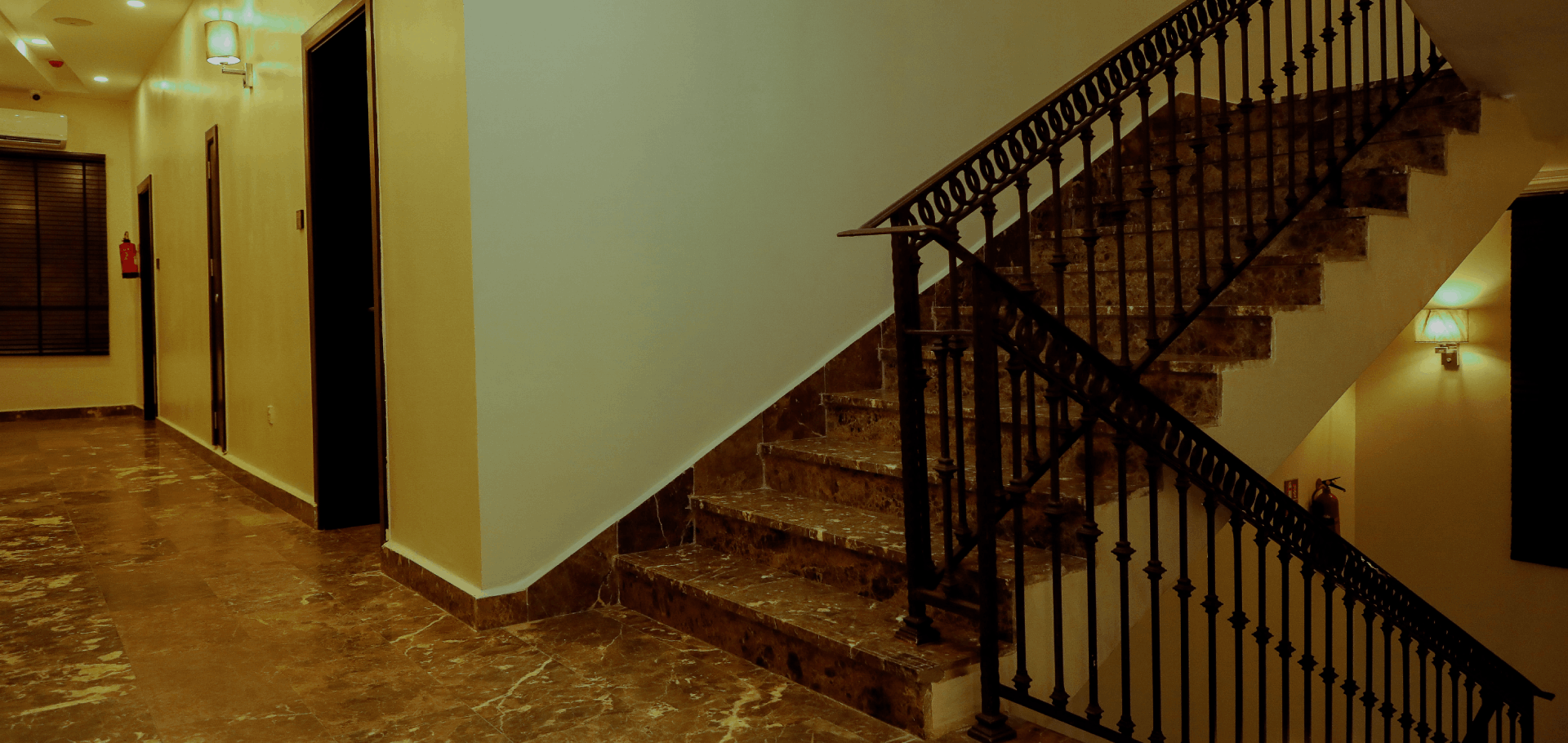 Interior staircase at Rownez Resort